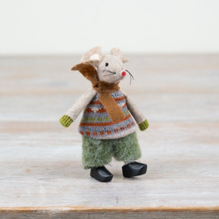 Handmade toy mouse in a sweater on a wooden surface