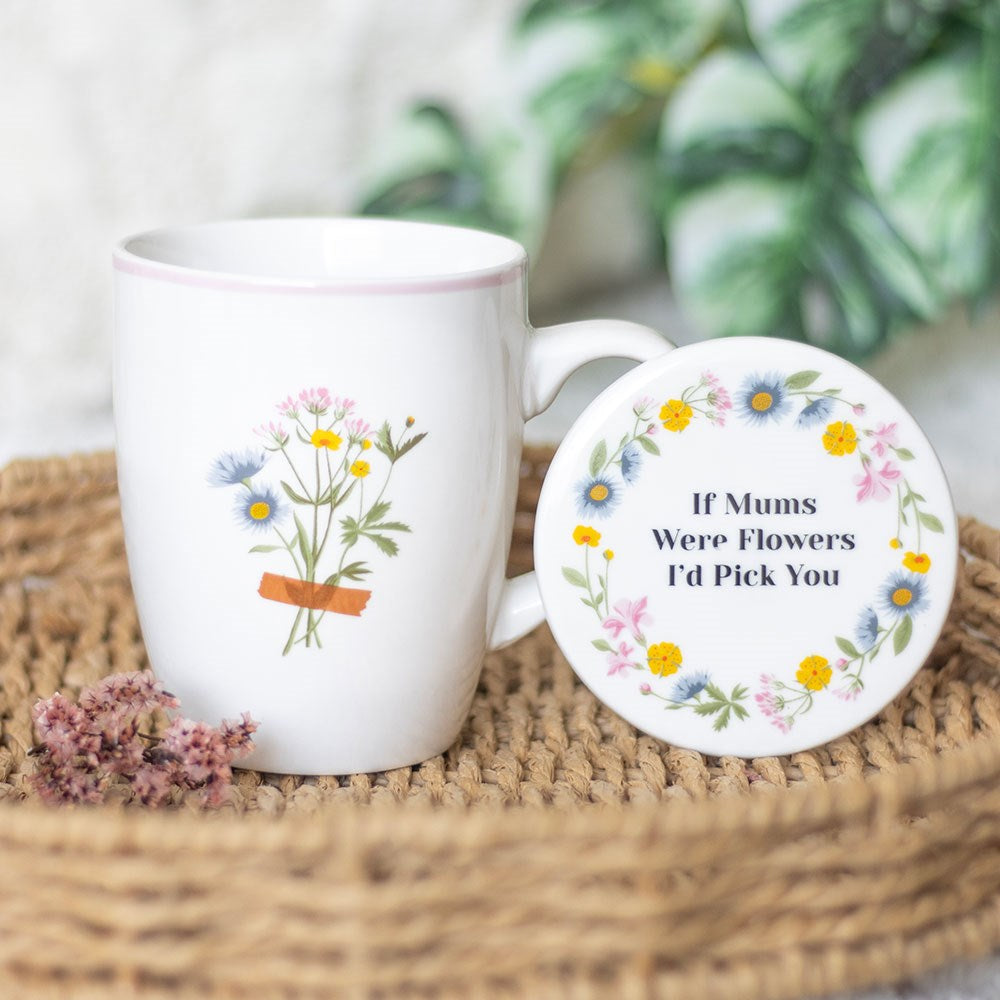 White ceramic mug with a bouquet of flowers design on the middle. Round ceramic coaster with text 'If mums were flowers i'd pick you' with floral design around the edge of the coaster. 