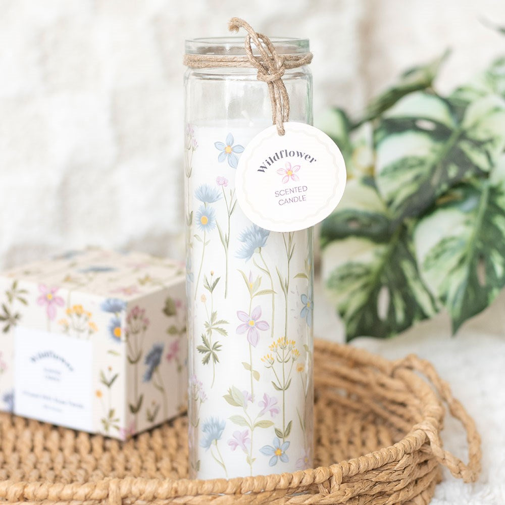 pillar candle in glass tube with pastel coloured floral design