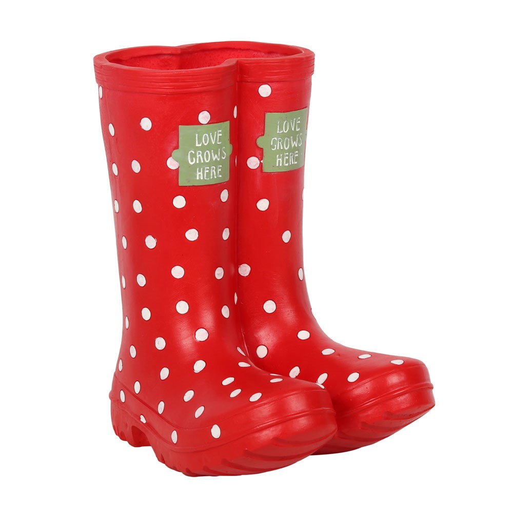 connected pair of red welly boots with white polka dot design and a green box on the front of the top of each boot with the text 'love grows here' inside