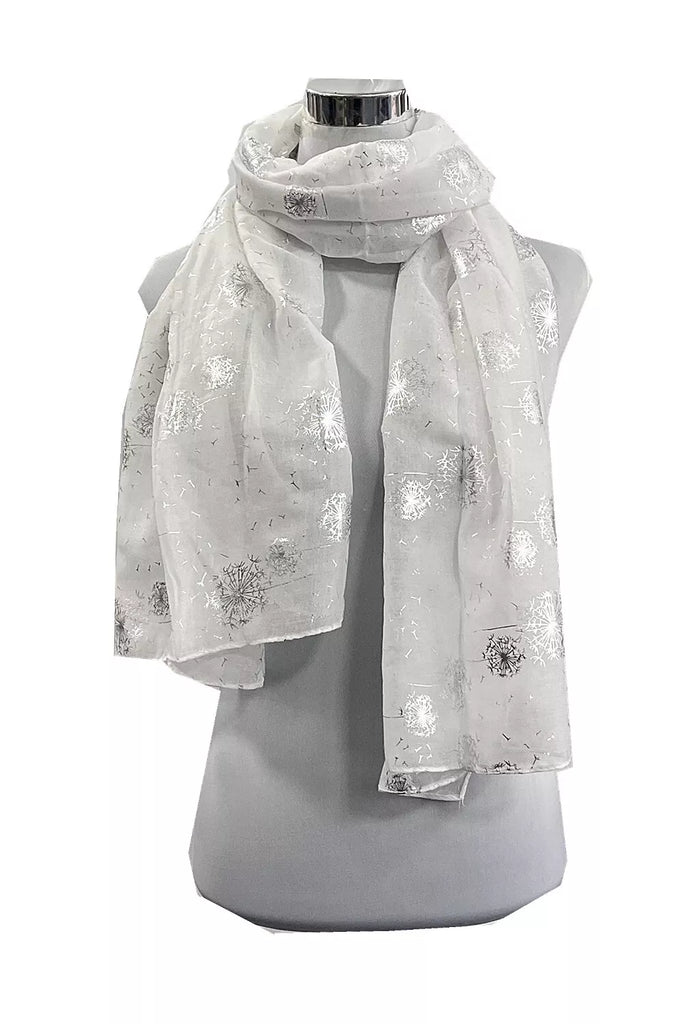 White scarf with floral patterns on a mannequin against a white background